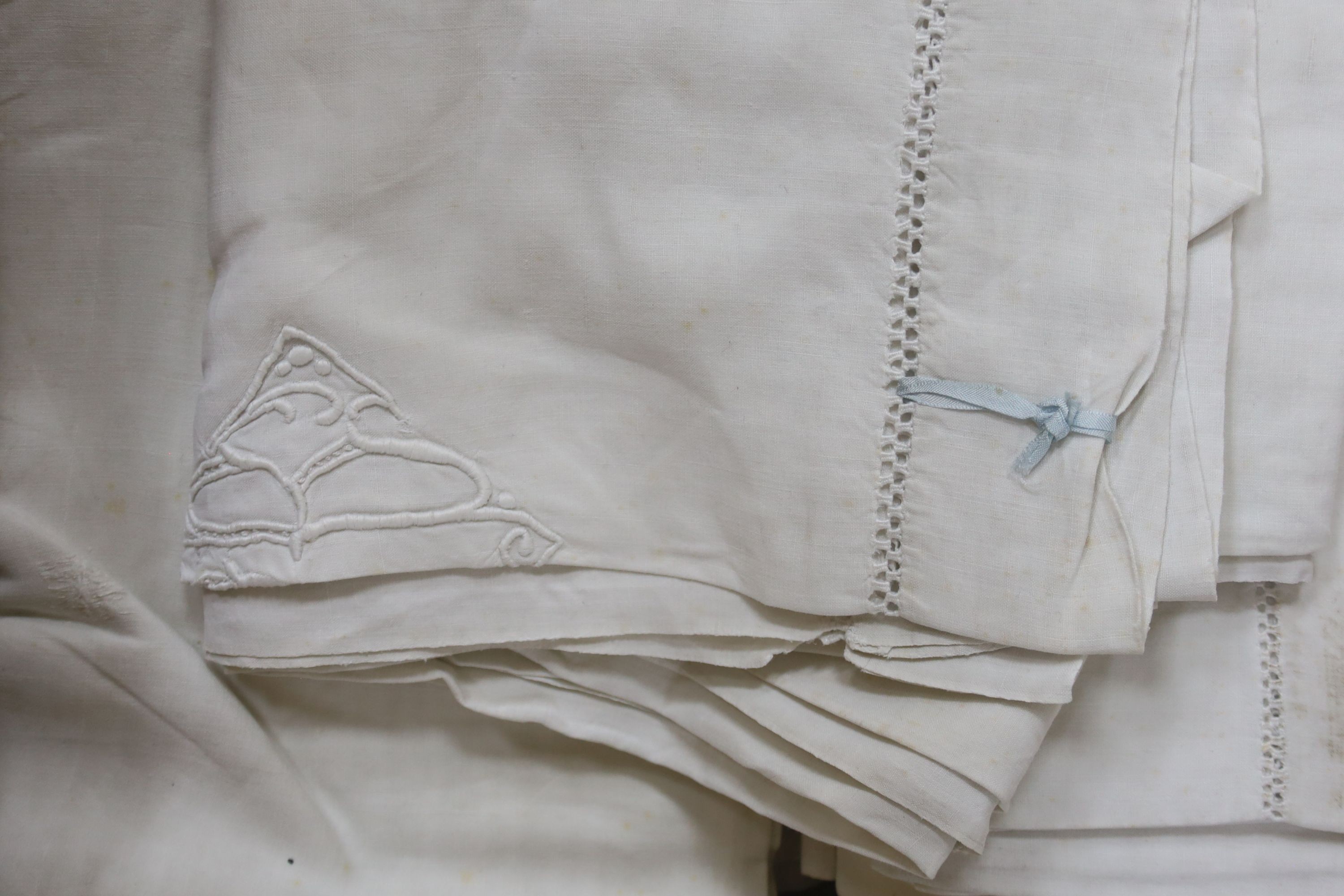 Six French provincial embroidered linen sheets